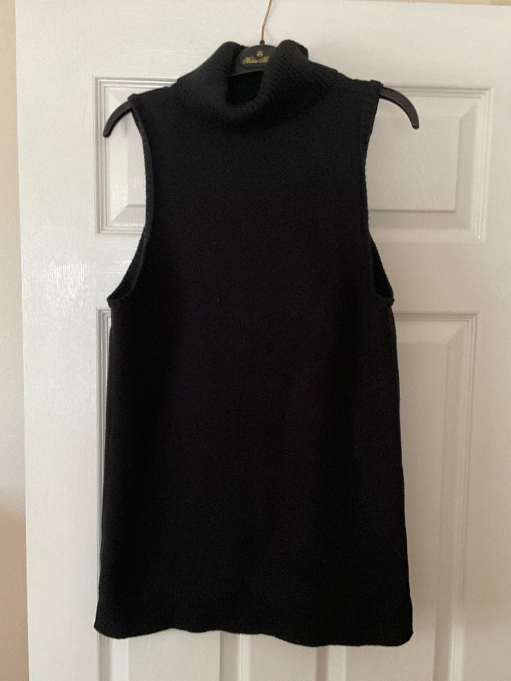 Ladies black J Crew sleeveless turtleneck black sweater